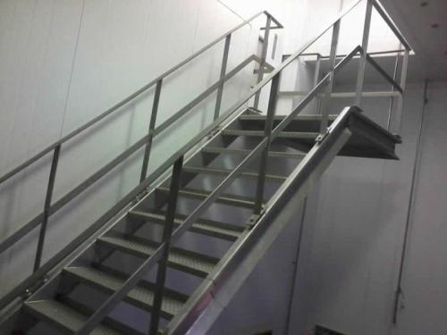 Steel staircase with rails